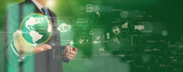 Businessman working virtual globe modern computer to reduce CO2 emissions carbon footprint climate change to limit global warming.Sustainable development and innovation green business concept.